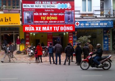 rua xe may tu dong